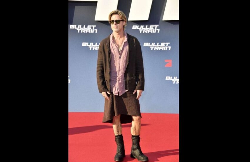 Brad Pitt mostra le gambe a Berlino dove sfila con la gonna